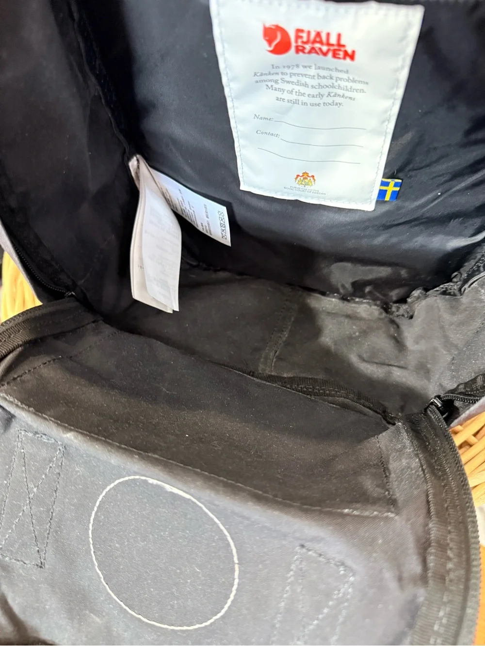 Fjallraven Kanken Mini Backpack in Black with Red Logo